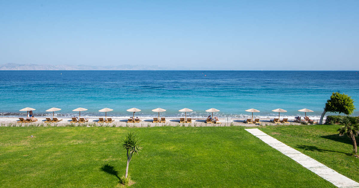 Ein Foto vom Strand beim Ixia Dream Beachfront Hotel