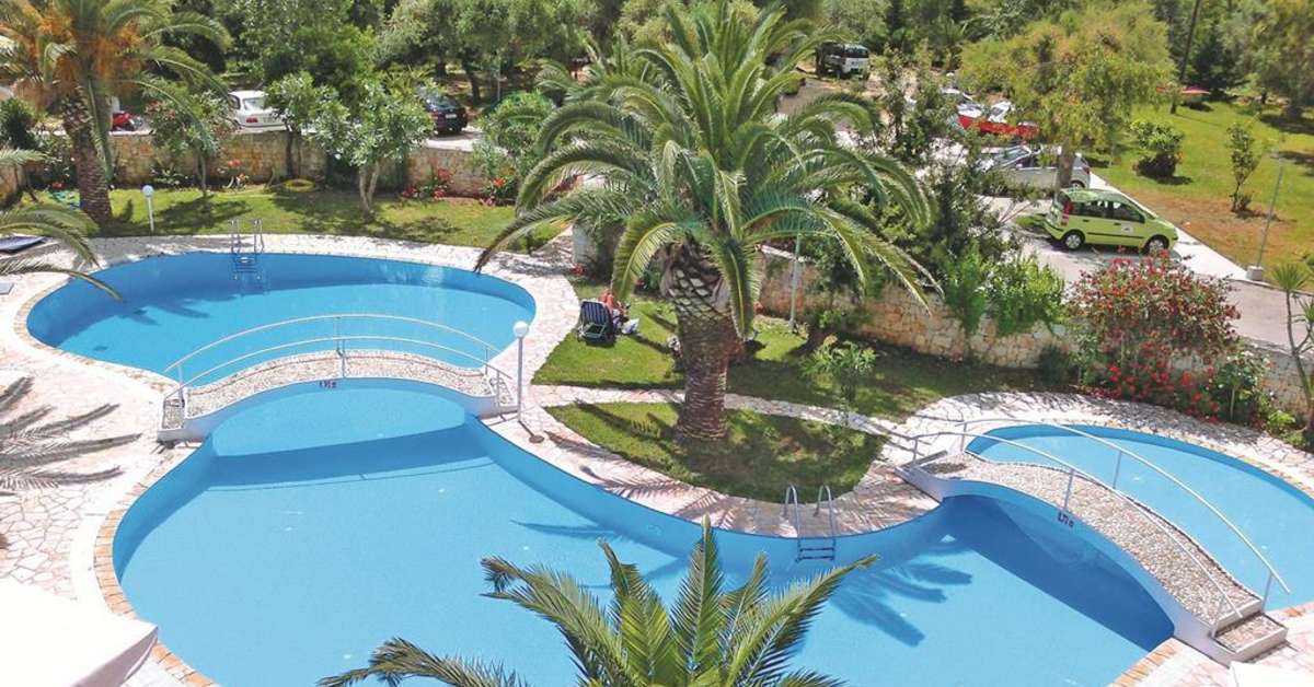 Een foto van het zwembad bij Three Stars Hotel Village