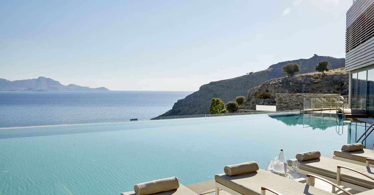 Een foto van het zwembad bij Lindos Blu Luxury Hotel & Suites