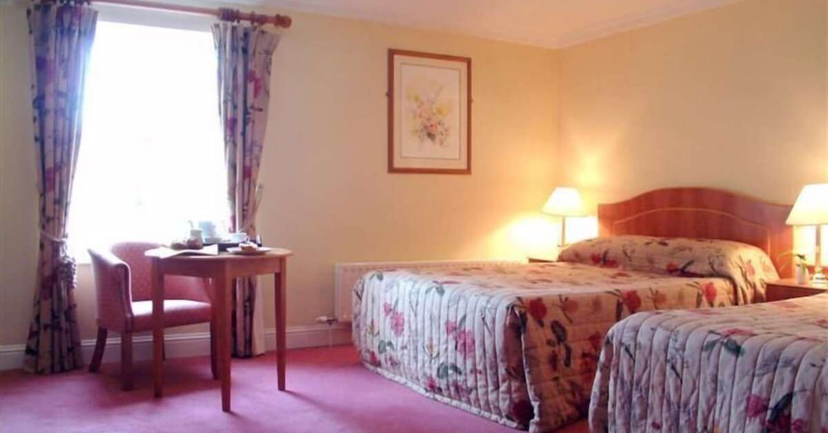 Een foto van Castle Oaks House Hotel
