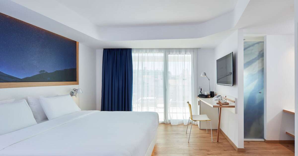 Ein Foto Olive Green Hotel