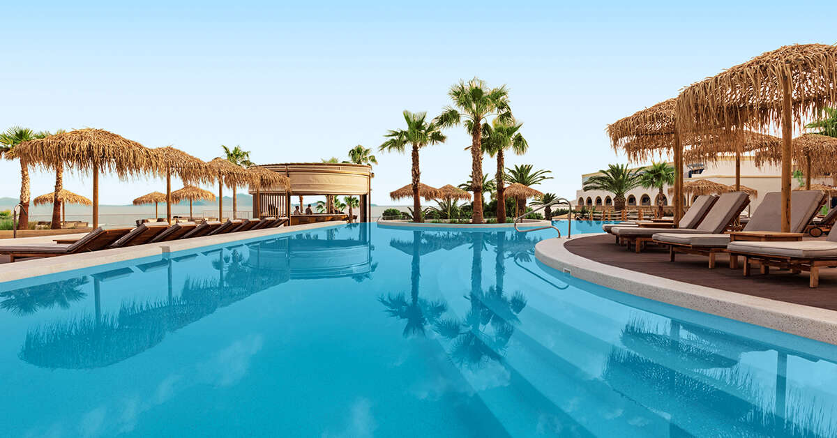 Een foto van het zwembad bij Mitsis Norida Beach Hotel