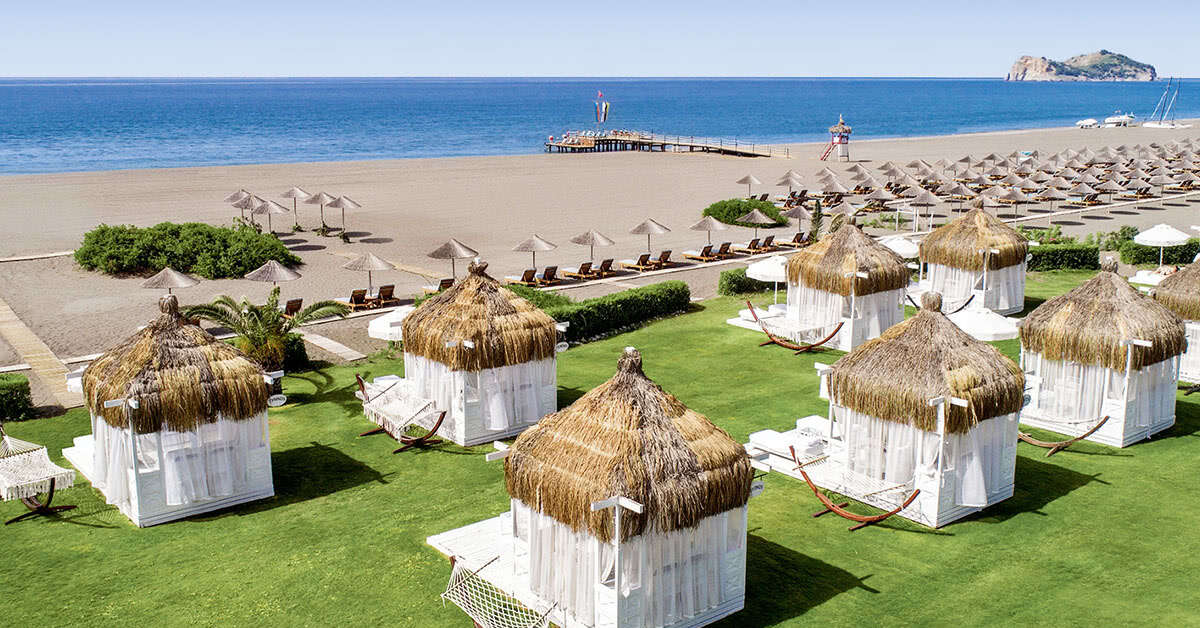 Een foto van het strand bij Hilton Dalaman Sarigerme Resort & Golf