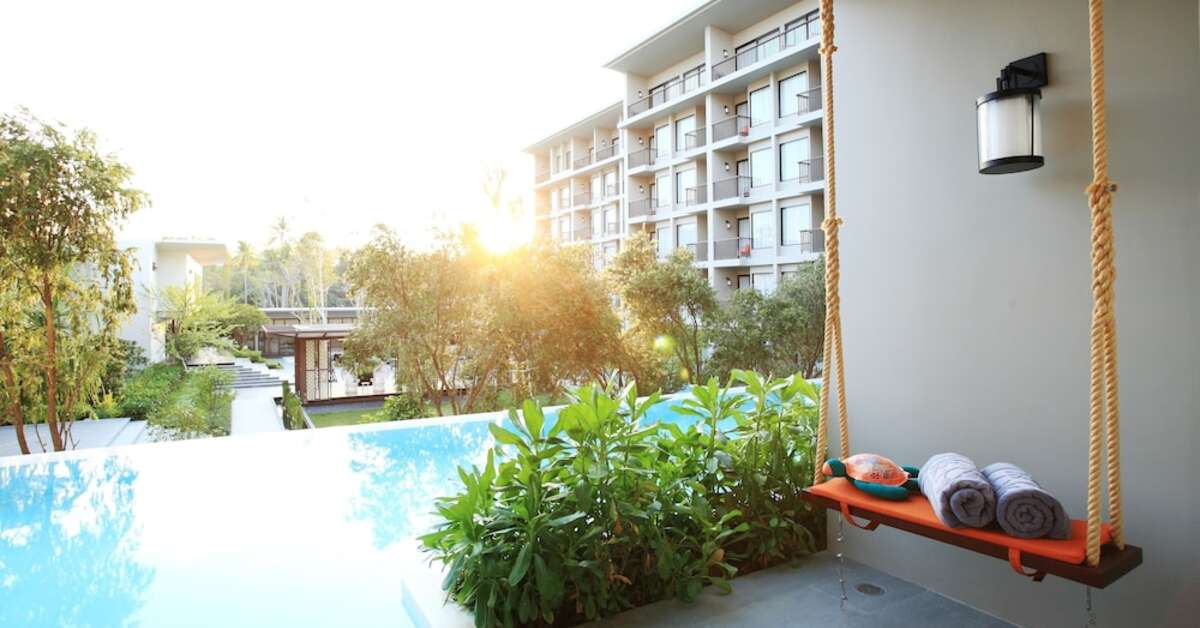 Een foto van het zwembad bij Proud Phuket Hotel