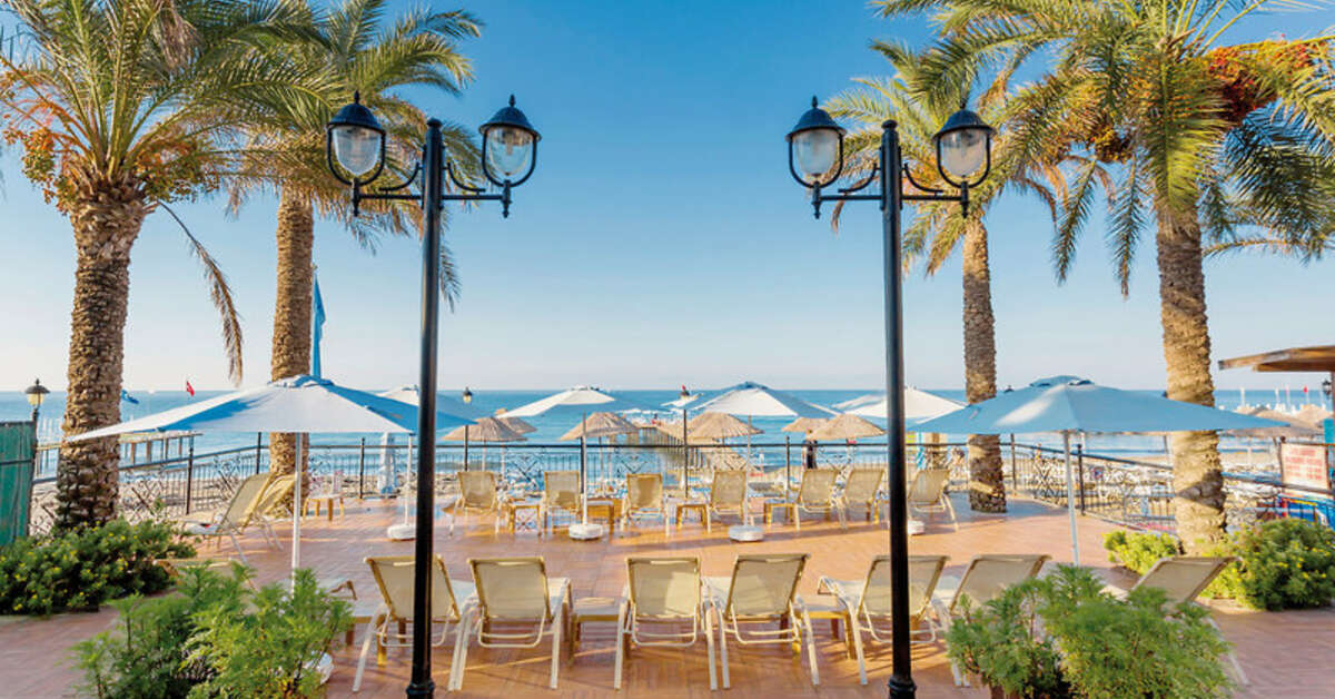 Een foto van het terras bij Quattro Family Club Dem Hotel
