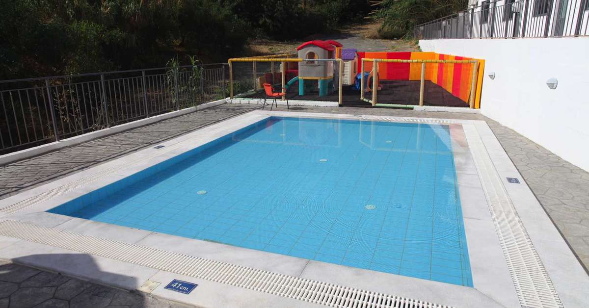 Een foto van het zwembad bij Panorama Village & Hotel
