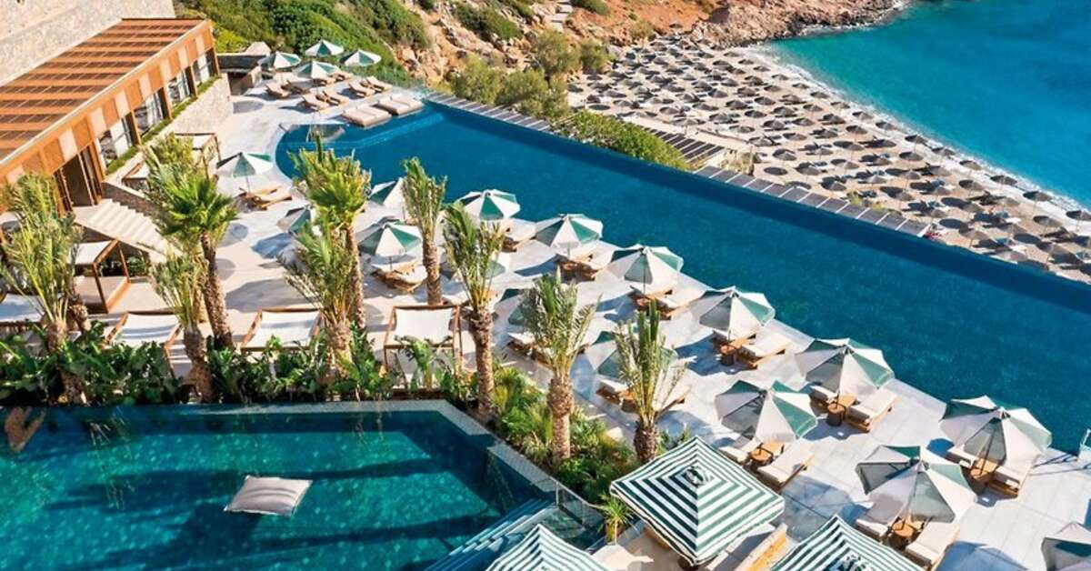 Een foto van het zwembad bij Daios Cove Luxury Resort & Villas