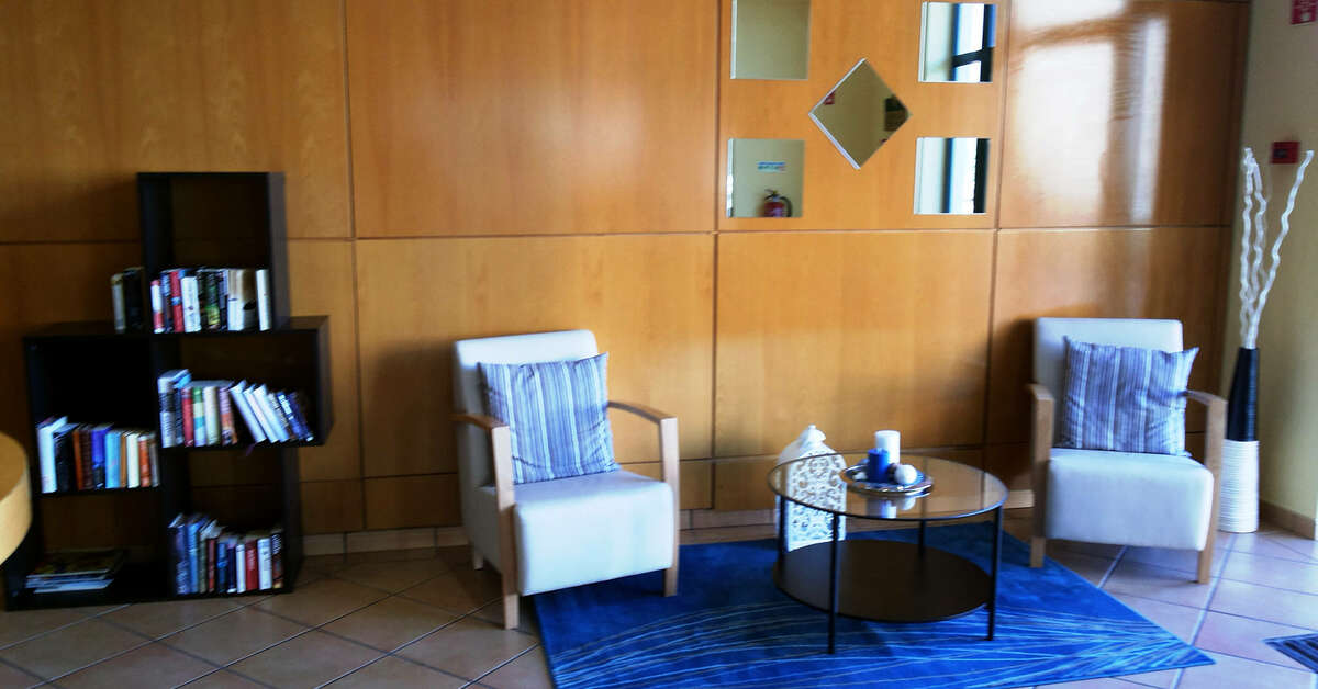 Een foto van het interieur van Plaza Real Aparthotel