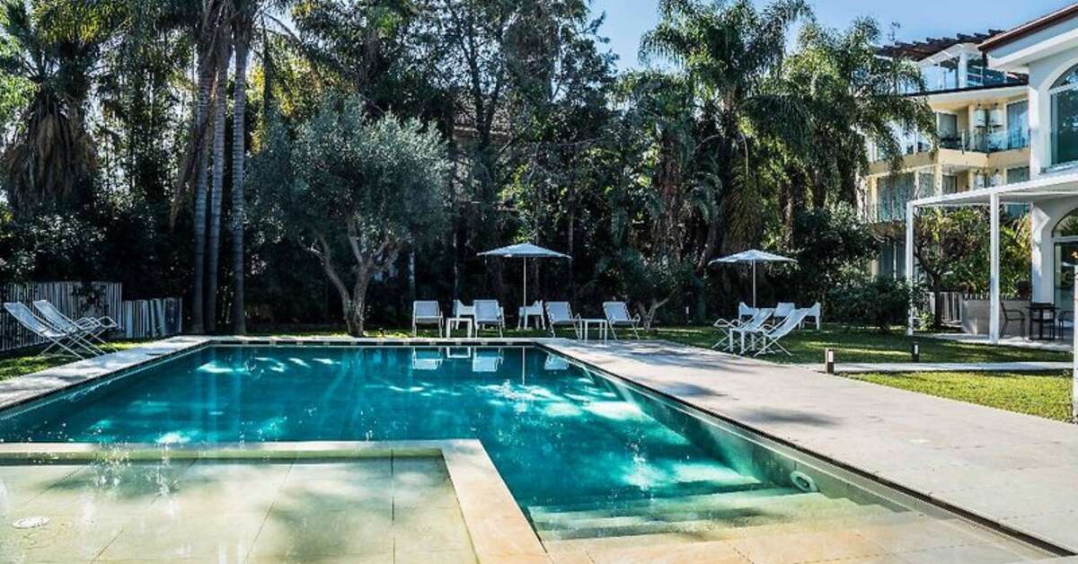 Een foto van het zwembad bij Sicilia's Residence Hotel Art & Spa