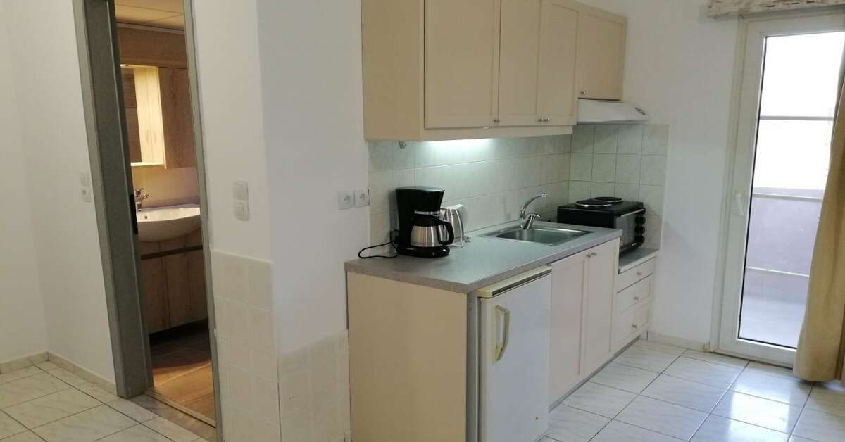 Ein Foto Evina Rooms & Villas