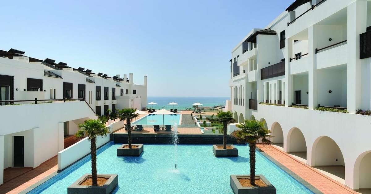 Een foto van het zwembad bij Belmar Spa & Beach Resort