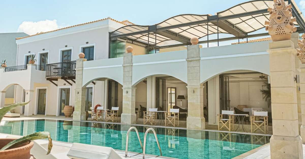Ein Foto vom Pool im Grecotel Plaza Beach House