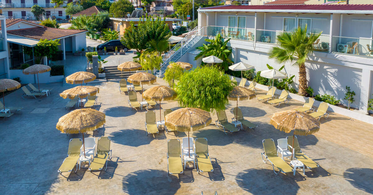 Een foto van het zwembad bij Papillon Hotel