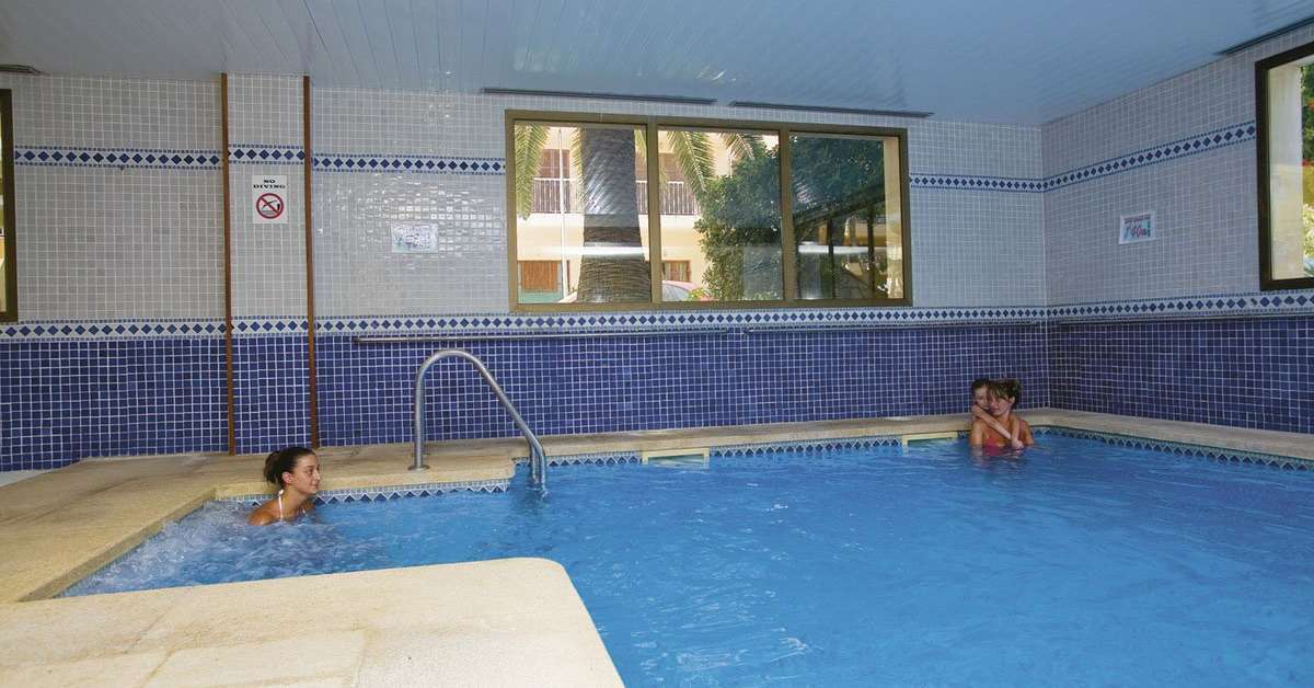 Een foto van het zwembad bij Caleia Talayot Spa Hotel