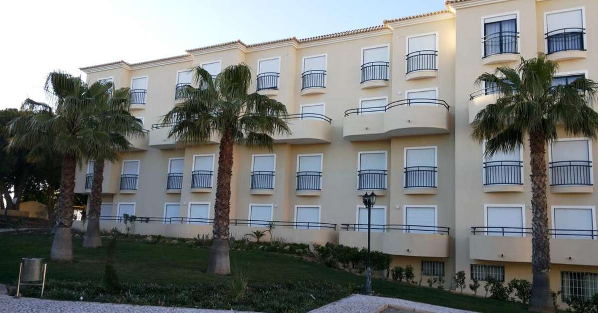 Een foto van de buitenkant van Plaza Real Aparthotel