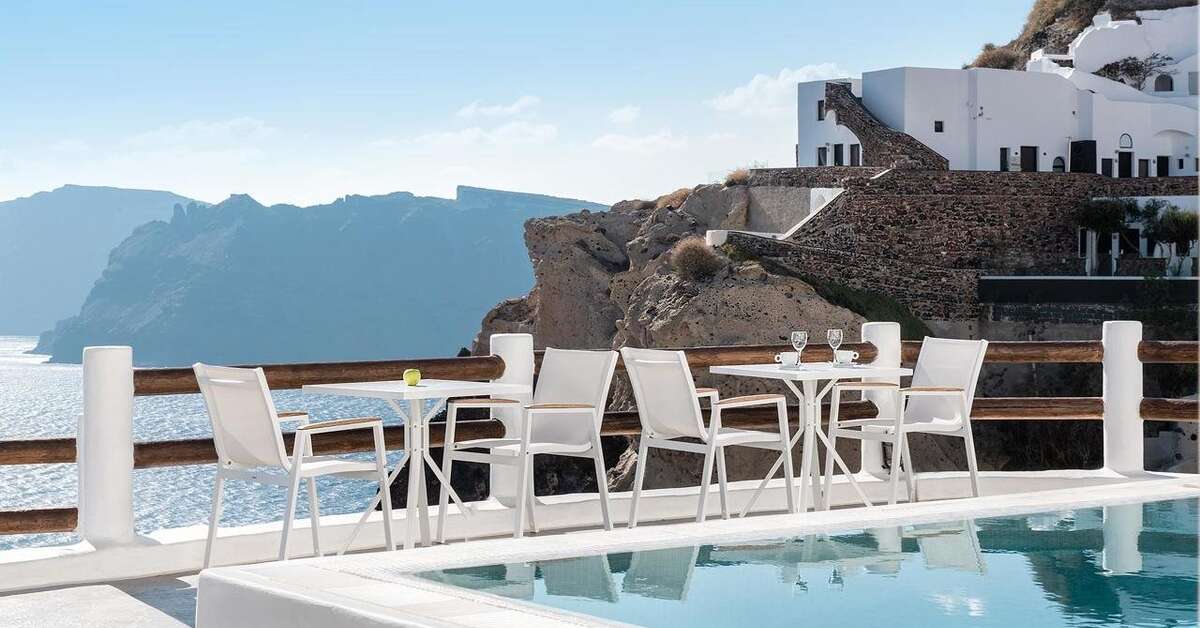 Een foto van het zwembad bij Caldera Premium Villas