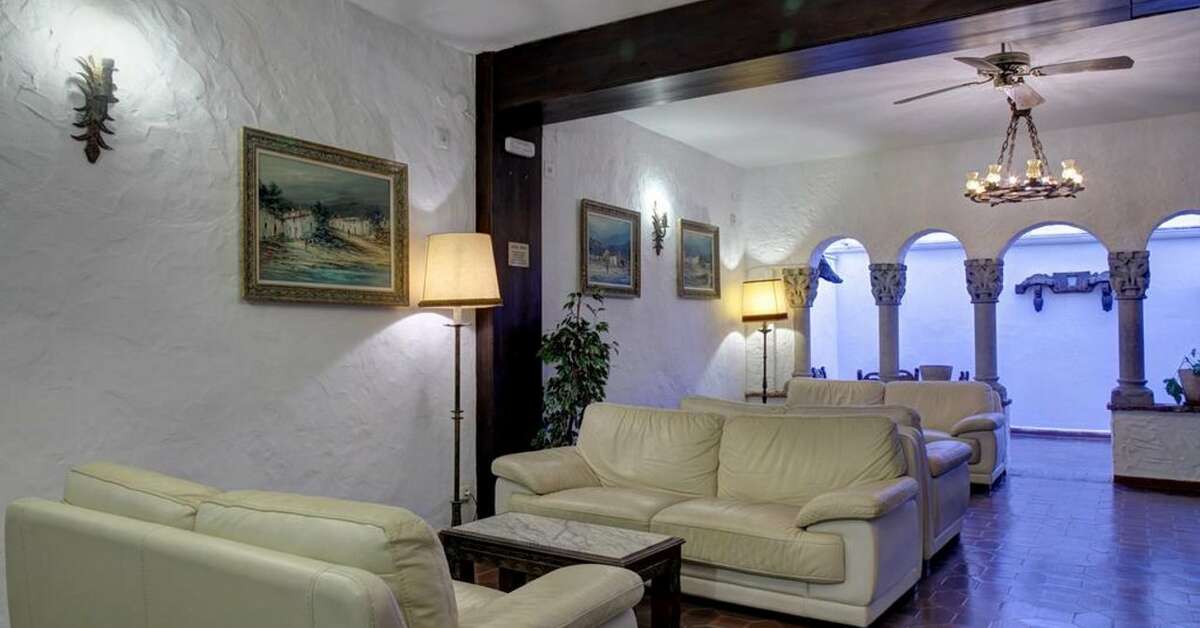 Een foto van het interieur van Hotel El Cid