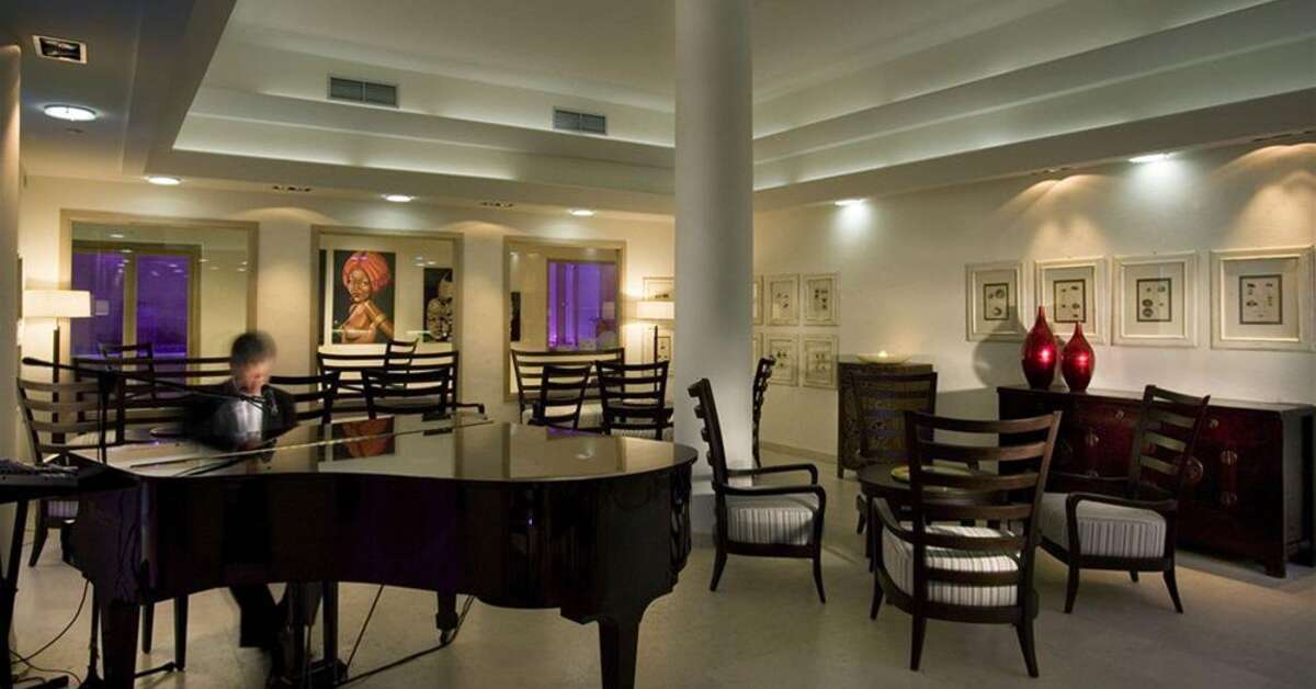 Een foto van het interieur van L'Ea Bianca Luxury Resort