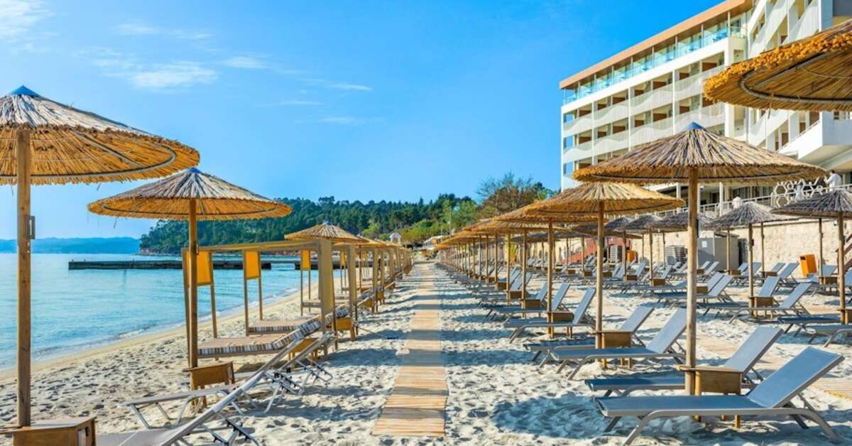 Een foto van het strand bij Ammon Zeus Hotel