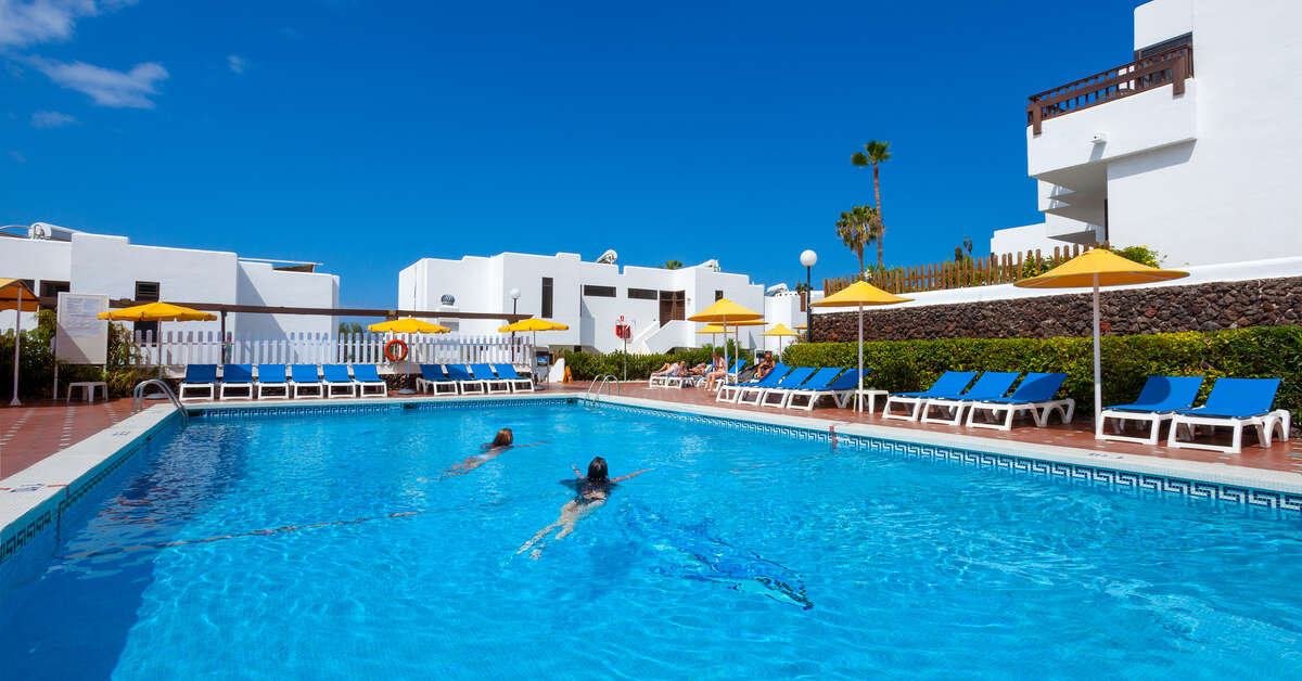 Een foto van het zwembad bij Paraiso del Sol & Paradero Appartementen