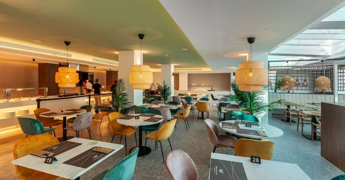 Een foto van het terras bij Kumara Serenoa by Lopesan Hotels