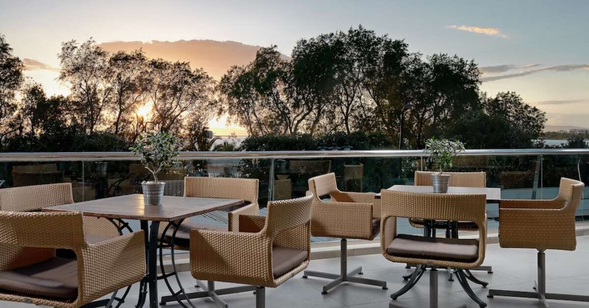 Een foto van het terras bij Divani Apollon Palace & Thalasso