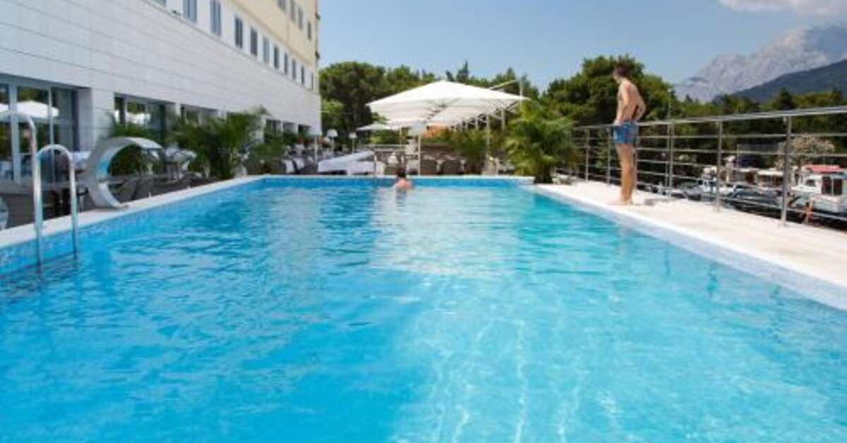 Een foto van het zwembad bij Aparthotel Miramare