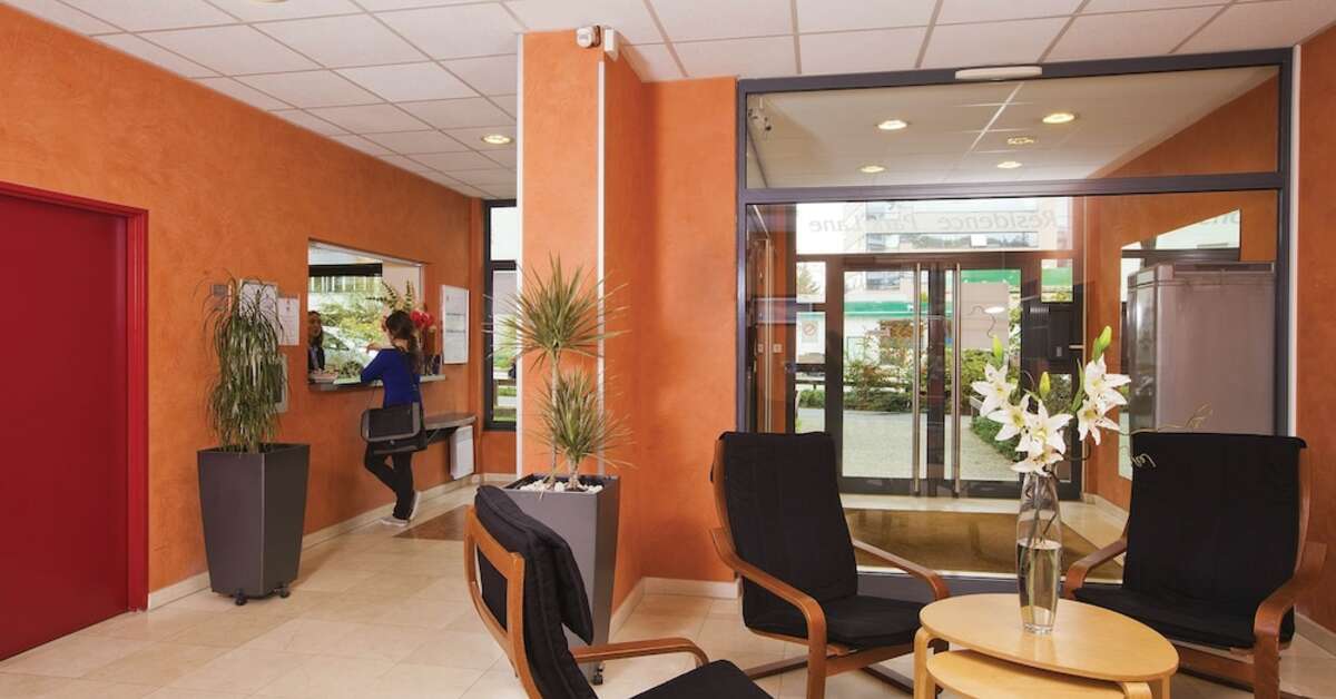Een foto van het interieur van Sejours Et Affaires Lyon Park Lane