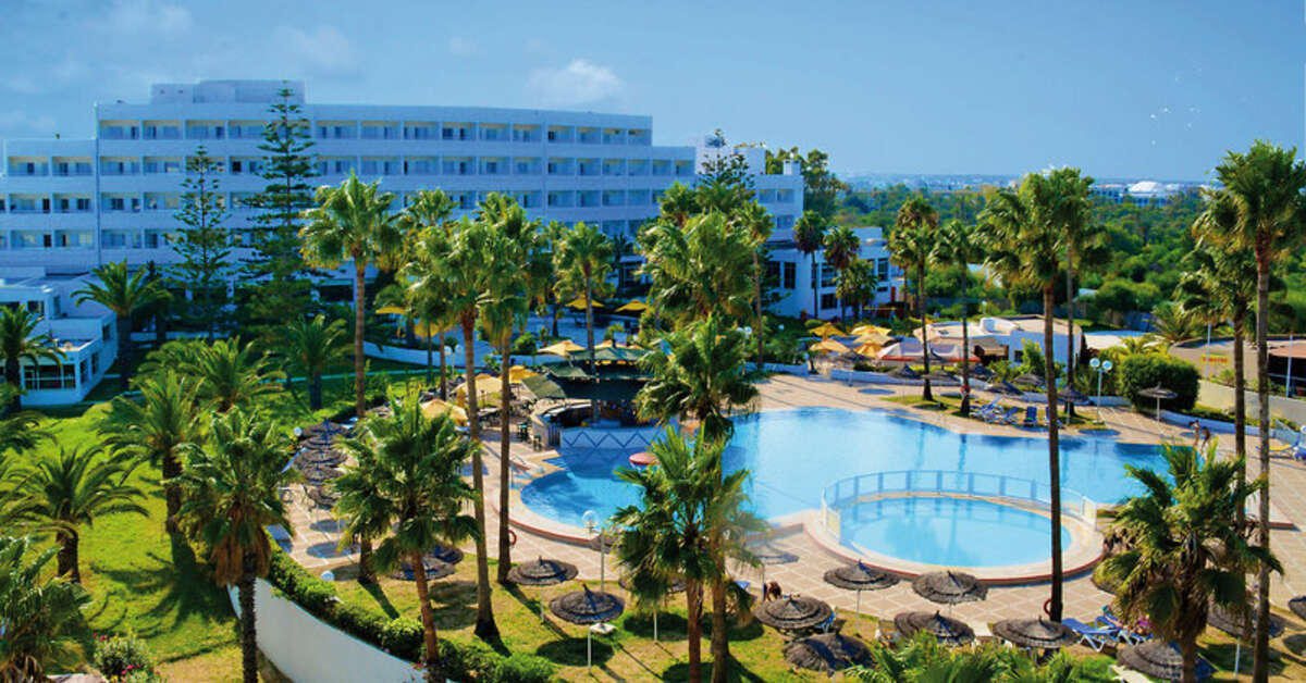 Een foto van het zwembad bij Hotel Club Tropicana & Spa