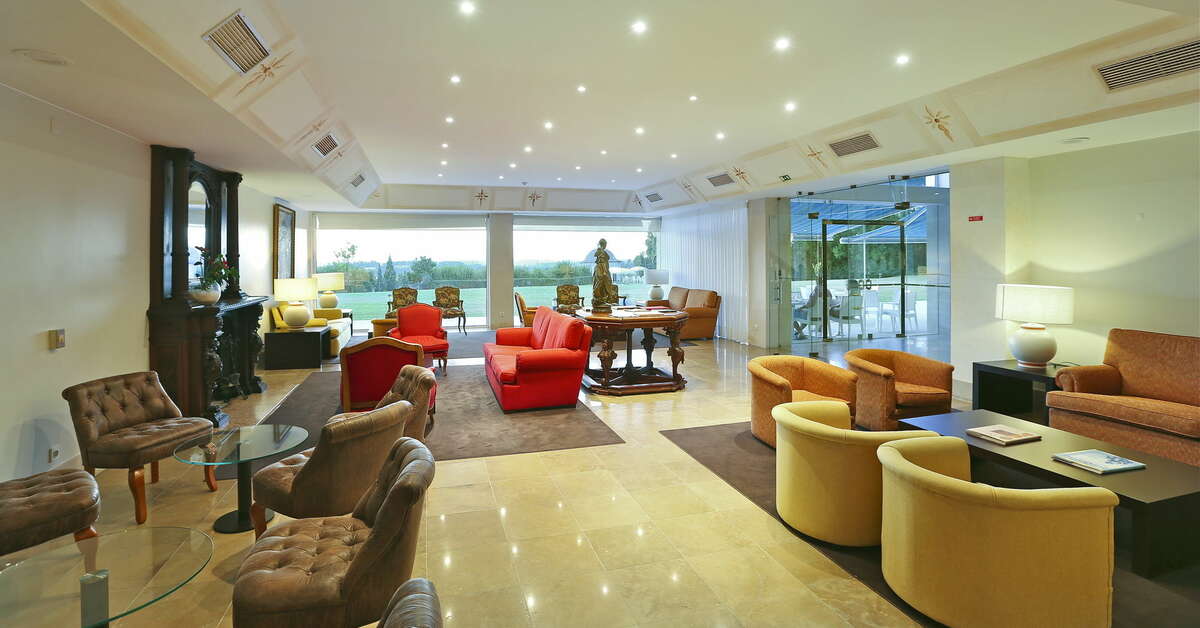 Een foto van het interieur van Conimbriga Hotel do Paco