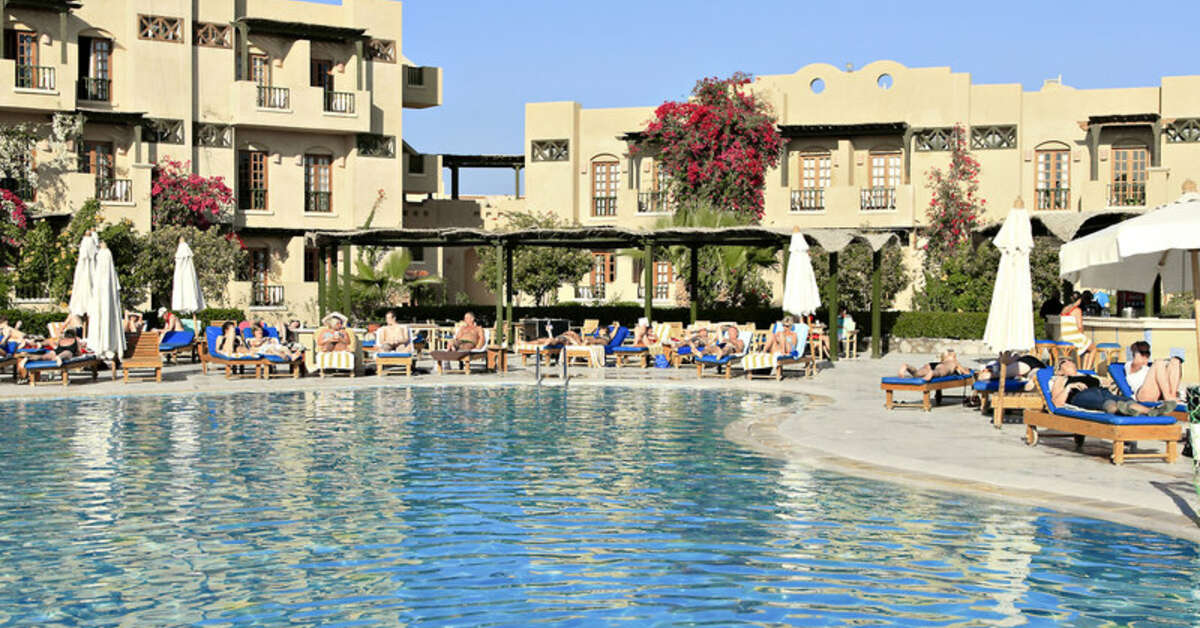Een foto van het strand bij The Three Corners Rihana Inn