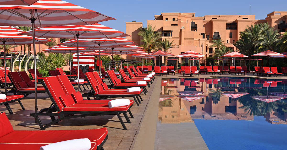 Een foto van het zwembad bij Mövenpick Hotel Mansour Eddahbi Marrakech
