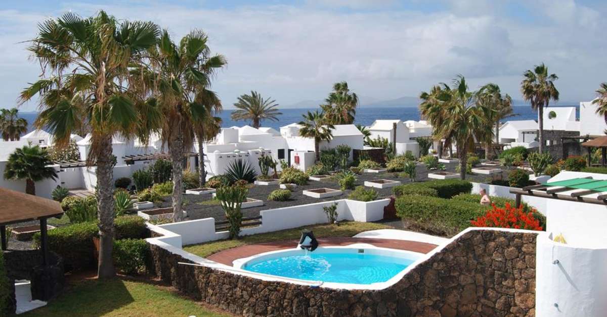 Een foto van het zwembad bij Kamezi Boutique Villas