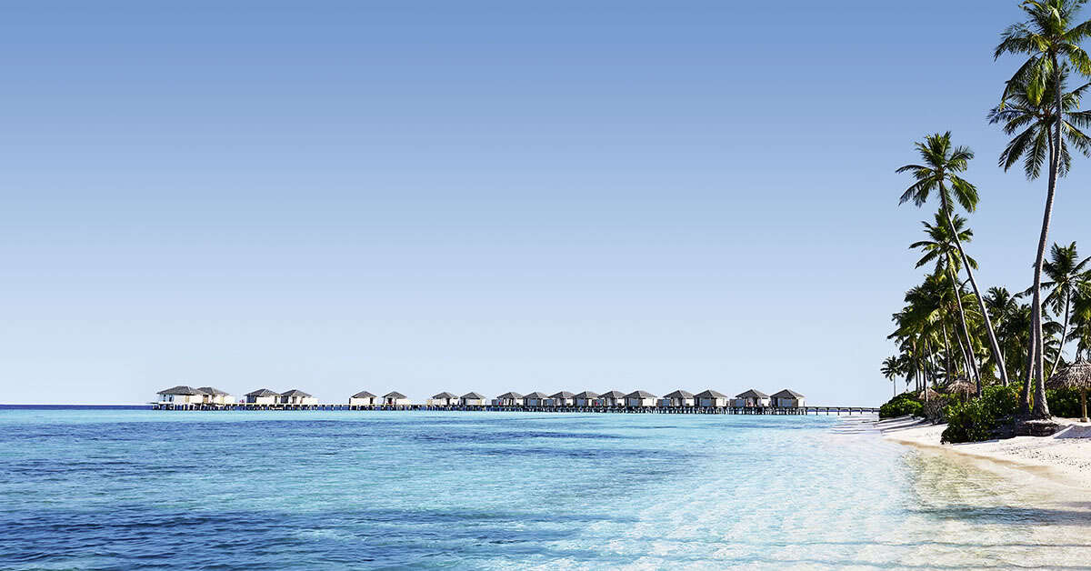 Een foto van het strand bij NH Collection Maldives Havodda Resort
