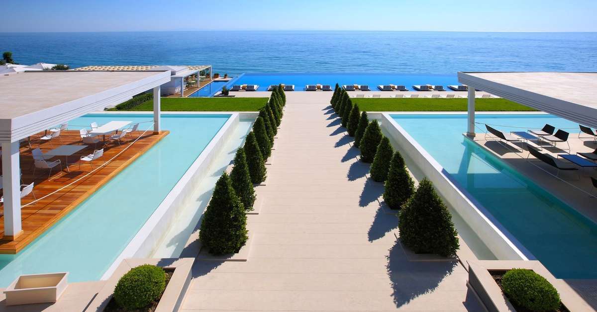 Een foto van het zwembad bij Cavo Olympo Luxury Hotel & Spa