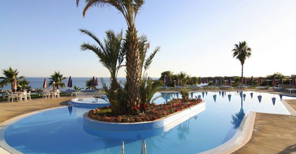 Een foto van het zwembad bij Corallia Beach Appartementen