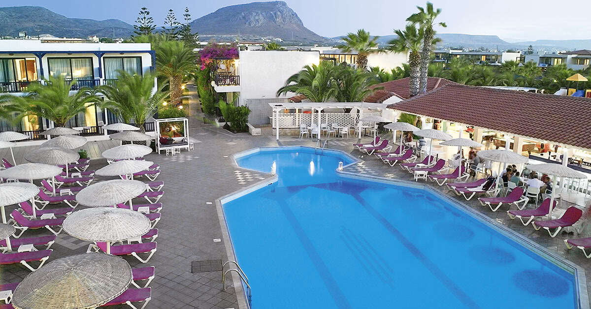 Een foto van het zwembad bij Stella Village Seaside Hotel