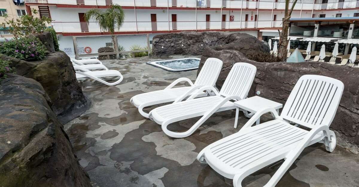 Een foto van het terras bij Hotel Papi