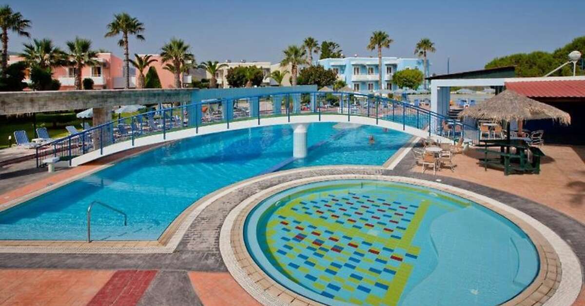 Een foto van het zwembad bij Corali Hotel & Village