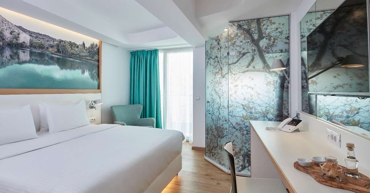 Ein Foto Olive Green Hotel