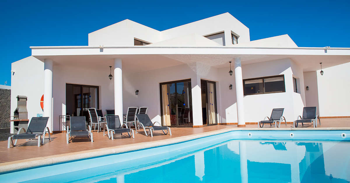 Een foto van het zwembad bij Villas Blancas