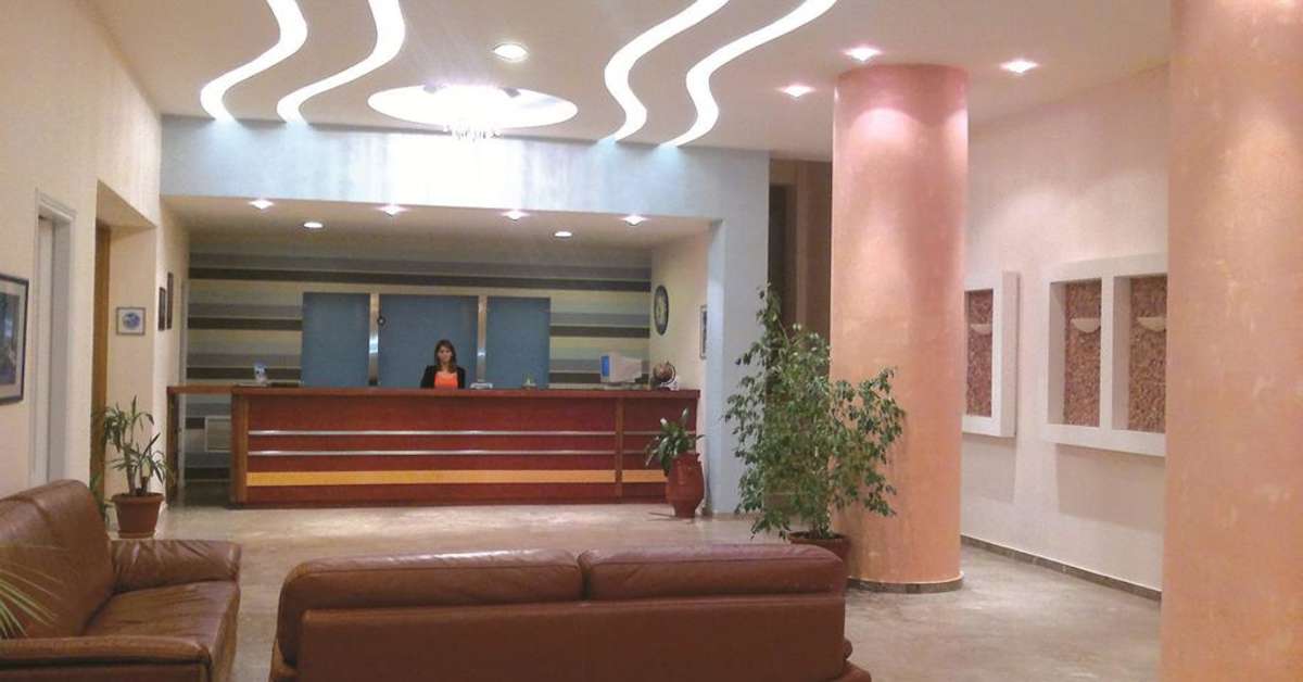 Een foto van het interieur van Three Stars Hotel Village