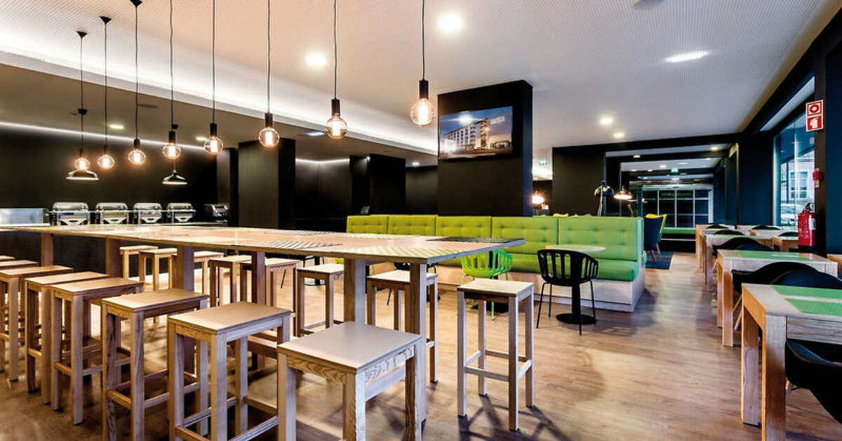Een foto van de faciliteiten bij Neat Hotel Avenida