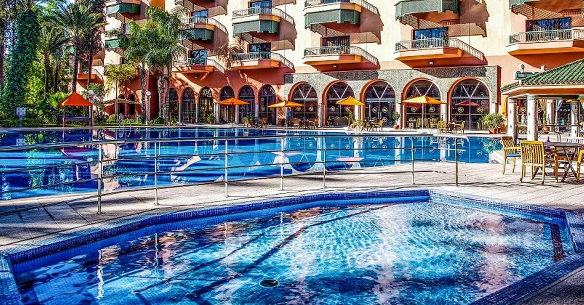 Een foto van het zwembad bij Royal Mirage Deluxe Hotel