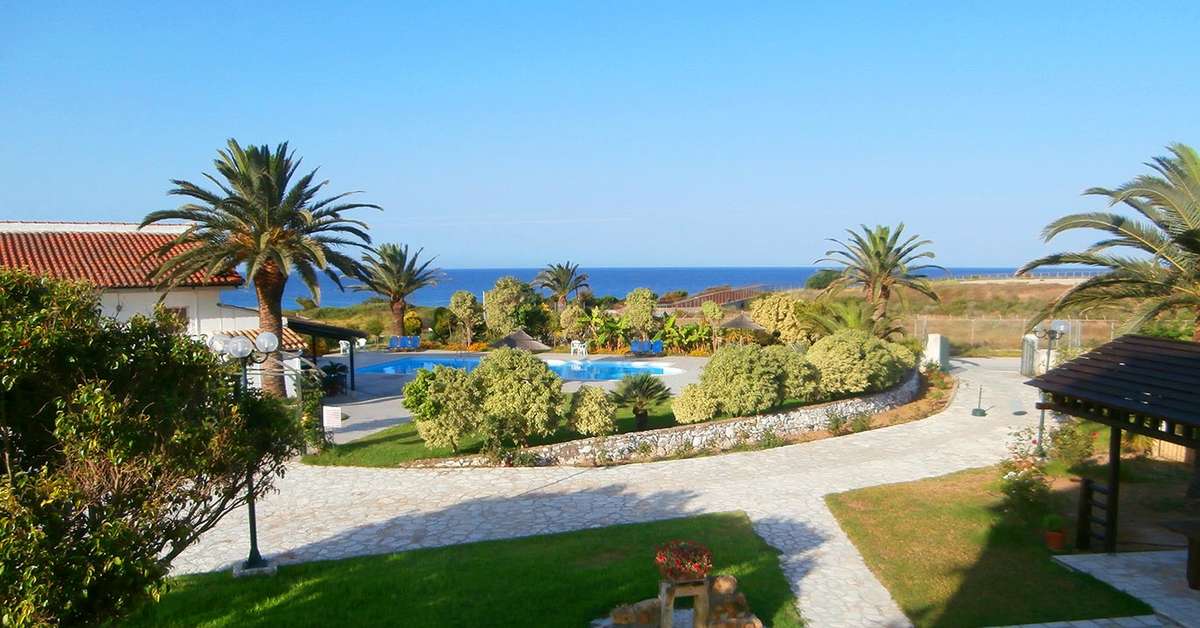 Een foto van het zwembad bij Sandy Beach Villas & Appartementen