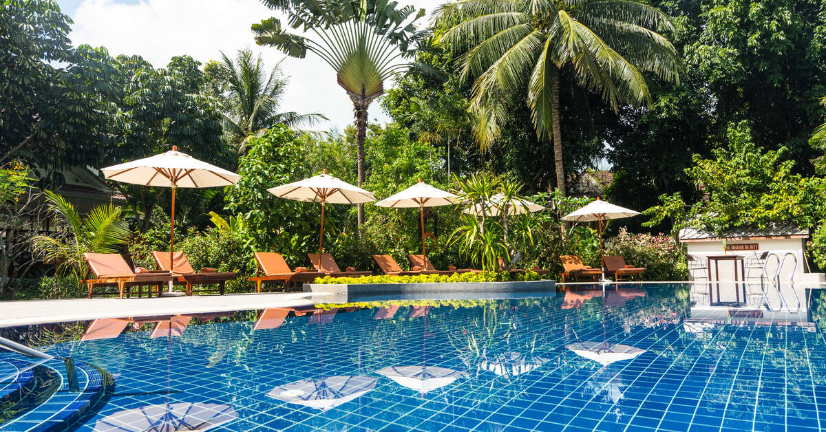 Een foto van het zwembad bij Paradise Beach Resort