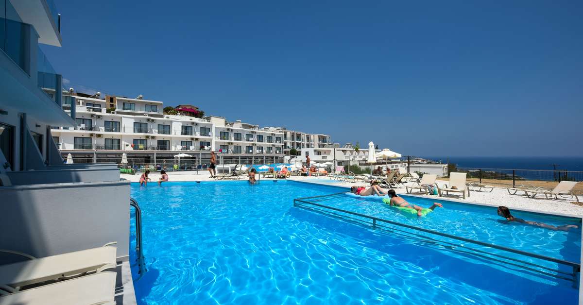 Een foto van het zwembad bij Panorama Village & Hotel