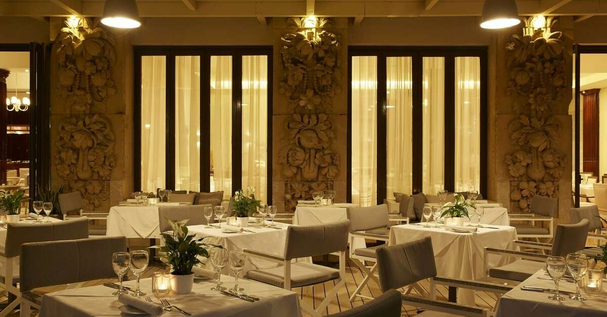Een foto van het terras bij Mon Repos Palace Hotel