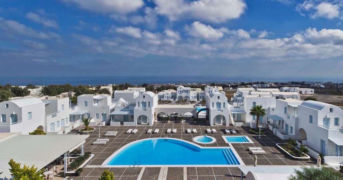 Een foto van het zwembad bij El Greco Resort & Spa