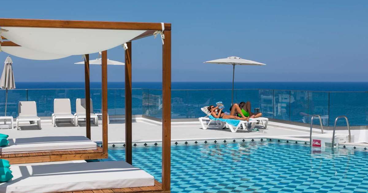 Een foto van het zwembad bij Bali Blue Bay Hotel